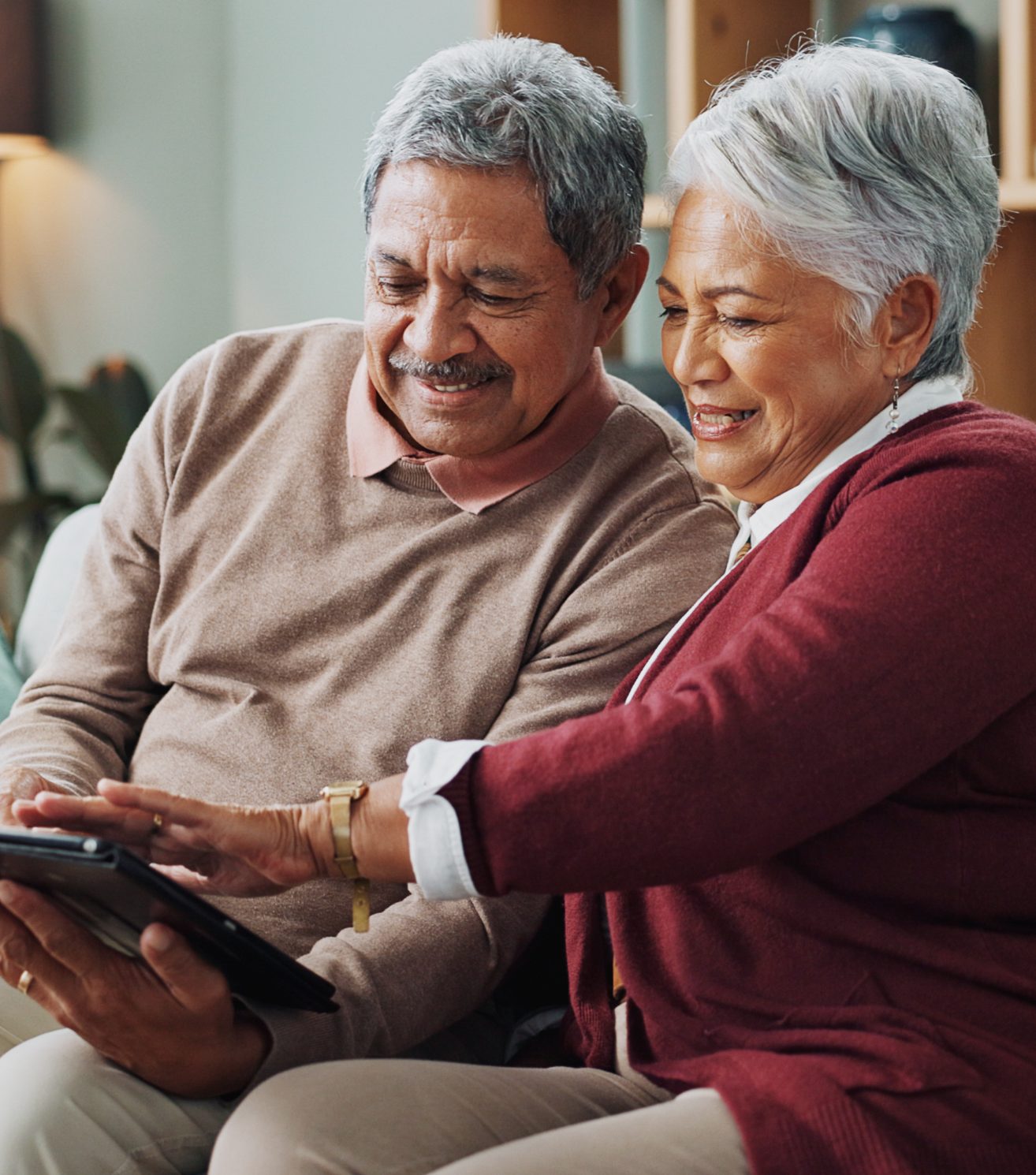 Retired couple reviewing their membership options together